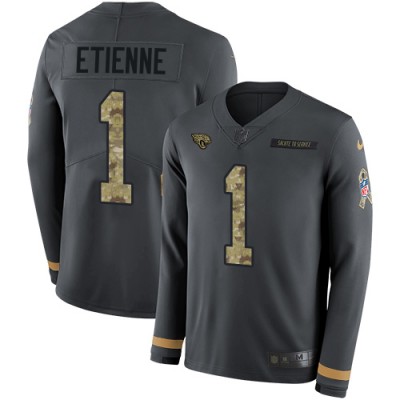 Nike Jacksonville Jaguars #1 Travis Etienne Anthracite Salute to Service Men's Stitched NFL Limited Therma Long Sleeve Jersey Men's